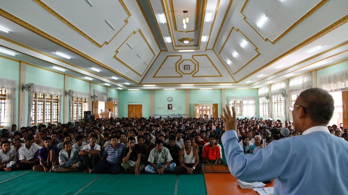 Muslims seeking shelter at a monastery listen to a speech by Religious Affairs Minister San Sint at Lashio township May 31, 2013. (Reuters)