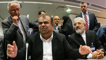 Iranian Oil Minister Rostam Ghasemi (C) talks to journalists before an OPEC meeting in Vienna May 31, 2013. (AFP)