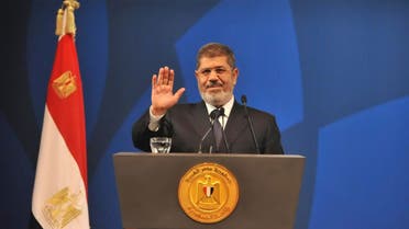 Egyptian President Mohamed Mursi speaks in a conference and exhibition organised by civil society organizations in Cairo in this handout picture provided by the Egyptian Presidency dated May 29, 2013. (Reuters)