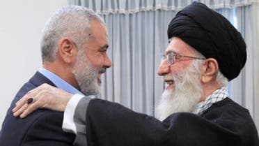 In this photo provided by an official website of the Iranian supreme leader's office, supreme leader Ayatollah Ali Khamenei, right, greets Hamas' Ismail Haniyeh, in Tehran, Feb. 12, 2012. (Photo courtesy of AP)