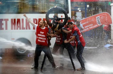 Riot police use a water cannon to disperse demonstrators during a protest against Turkey's Prime Minister Tayyip Erdogan and his ruling Justice and Development Party (AKP) in central Ankara May 31, 2013. (Reuters)