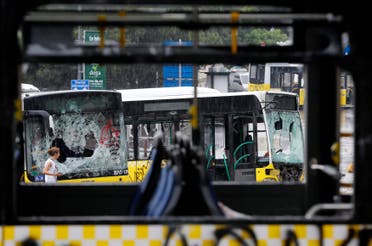 Damaged buses are seen in Taksim where police and anti-government protesters clashed in central Istanbul June 2, 2013. (Reuters)