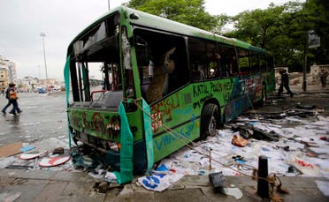 Damaged buses are seen in Taksim where police and anti-government protesters clashed in central Istanbul June 2, 2013. (Reuters)