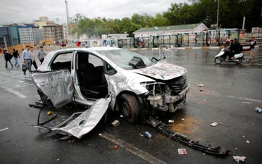 Damaged car is seen in Taksim where police and anti-government protesters clashed in central Istanbul June 2, 2013. (Reuters)