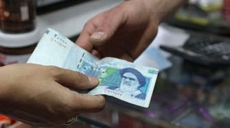 Iran unifies official and open market exchange rates as rial hit new low