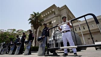 Egypt court sentences 43 NGO employees to prison