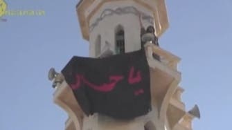 Video: Hezbollah fighters raise flag on Qusayr mosque 