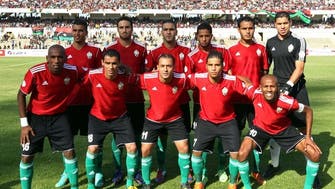 Soldiers and police on patrol for Libya’s soccer return