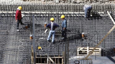 Construction workers in Amman, Jordan, where a consortium led by Dubai’s Arabtec has won a $629m contract. (File photo: Reuters)