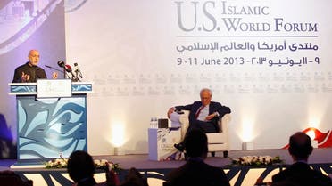 Afghanistan's President Hamid Karzai (L) speaks during the U.S.- Islamic World Forum in Doha June 9, 2013. (Reuters)