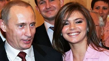 Russian President Vladimir Putin next to Russian gymnast Alina Kabaeva in this undated photo: (File Photo: Reuters)