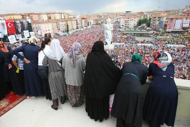 Supporters listen to a speech by Turkish prime minister during a rally in Sincan on June 15, 2013. (AFP)