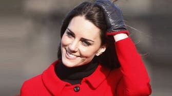 Photographer charged over topless photos of Britain’s Kate  