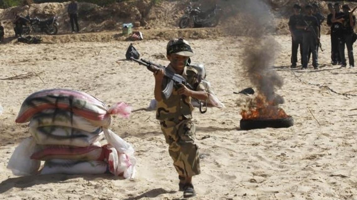 A Palestinian boy takes part in a military-style summer camp during the youngsters' summer school vacation in Rafah town, in the southern Gaza Strip. AFP Read more: http://www.news.com.au/lifestyle/parenting/what-summer-camps-are-like-for-palestinian-children-on-the-gaza-strip/story-fngqim8m-1226662969335#ixzz2WZ6omnMa