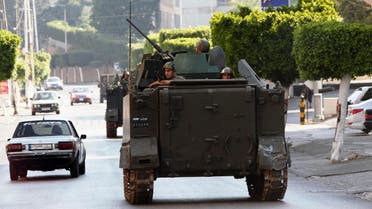 Lebanese army soldiers patrol a street in Abra, near Sidon, southern Lebanon, June 18, 2013. (Reuters)