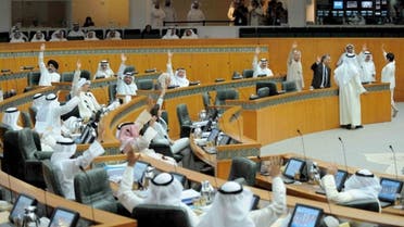 Kuwaiti MP vote during a parliament session at the Kuwait's National Assembly in Kuwait City. (File photo: AFP)