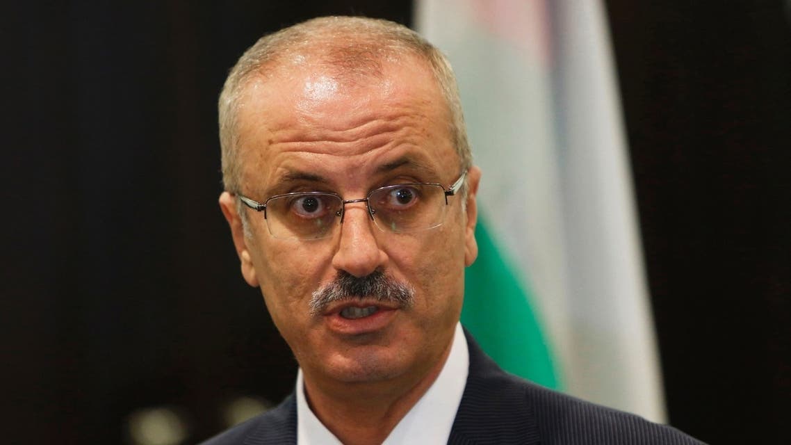 Palestinian Prime Minister Rami Hamdallah speaks during a joint news conference with European Union foreign policy chief Catherine Ashton (not seen) in the West Bank city of Ramallah, on June 19, 2013. (File photo: AFP)