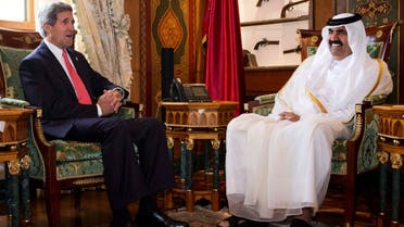 U.S. Secretary of State John Kerry (L) meets with Qatari Emir Hamad bin Khalifa Al Thani at Wajbah Palace in Doha June 23, 2013.
