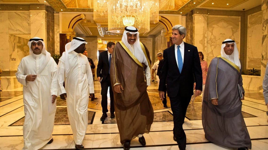 Kuwaiti Foreign Minister Sheikh Sabah Khalid al-Hamad al-Sabah (3rd L) walks with U.S. Secretary of State John Kerry, after Kerry's meeting with the Kuwaiti Emir at Bayan Palace in Kuwait City June 26, 2013. (Reuters)