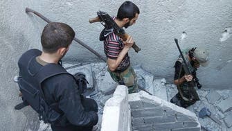 NGO: Syrian troops storm rebel town in Homs 