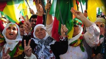 Kurdish women protest holding PKK flag