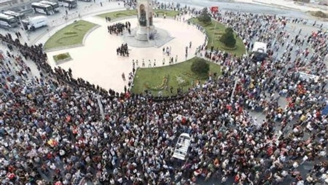 People shout anti-government slogans as they gather for a demonstration at Taksim Square in Istanbul June 29, 2013. Reuters