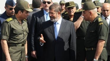 محمد مرسي وعبد الفتاح السيسي