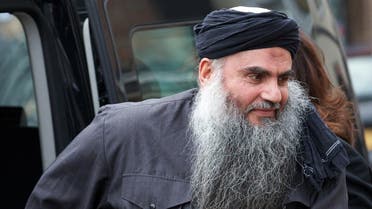 A file picture taken on November 13, 2012, shows Terror suspect Abu Qatada arriving at his home in northwest London, after he was released from prison. AFP