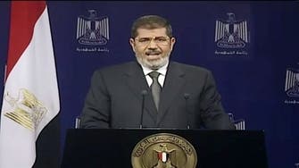 Egyptian President Mursi vows to defend ‘legitimacy’ with his life