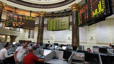 Traders work at the Egyptian stock exchange in Cairo July 4, 2013. (Reuters)