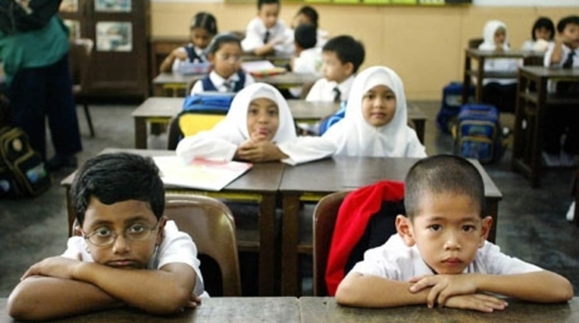 hildren attend their first day of elementary school in Standard One (Primary One) at a local school on the start of the new school year in Kuala Lumpur. Photograph: AFP