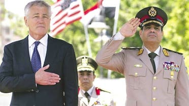 10:31 PM 24 April 2013  US Defence Secretary Chuck Hagel stands next to Egyptian Defence Minister General Abdel Fattah al-Sissi during an arrival ceremony at the defence ministry in Cairo yesterday.