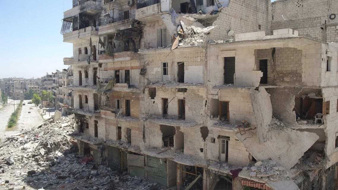 A view shows a street with damaged buildings in Aleppo's Salaheddine neighbourhood July 9, 2013.