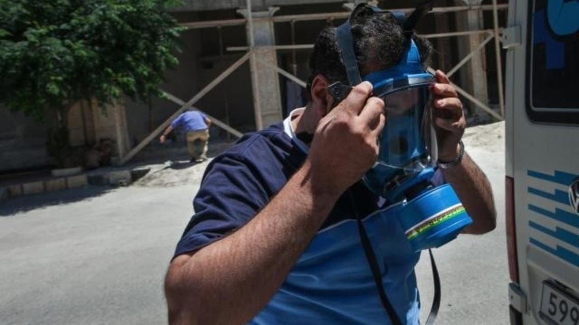 A picture shows an ambulance driver wearing a mask ahead of reports that chemical wepons were used in the northwestern province of Idlib. (File photo: AFP)