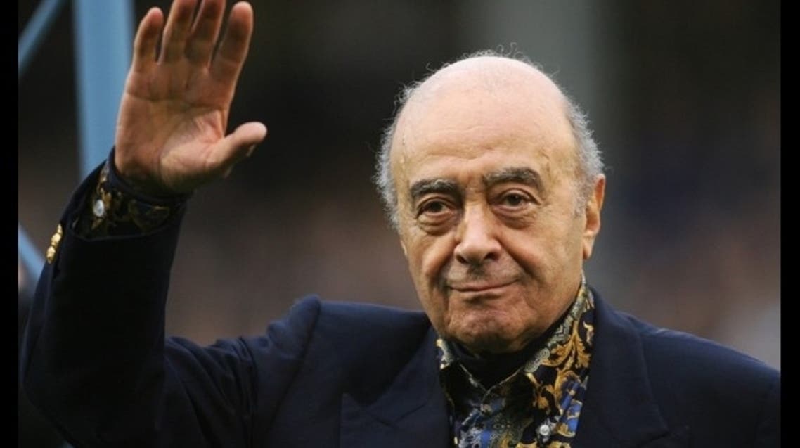 Fulham's owner Mohamed Al Fayed waves to the crowd before the Barclays Premiership football match against Tottenham Hotspur at Craven Cottage in west London, on November 15, 2008. (File Photo: AFP)