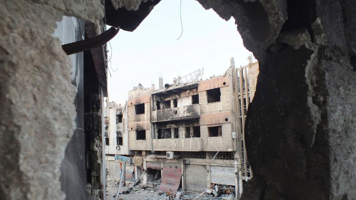 A view shows damaged buildings in the besieged area of Homs July 12, 2013.