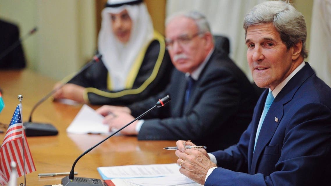 U.S. Secretary of State John Kerry sits with Palestinian Foreign Minister Riyad al-Maliki (2nd R) as he meets with the Arab League Peace Initiative at the Ministry of Foreign Affairs in Amman, July 17, 2013. (Reuters)