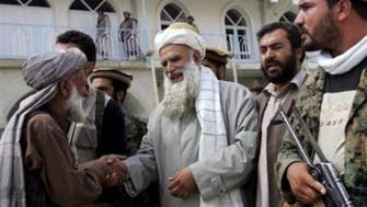In Ramadan quiet, Afghans jockey for post-Karzai era