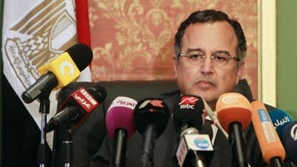 Egypt begins work on charter as Islamists press demos
