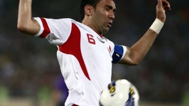 Iran's Javad Nekounam controls the ball during their 2014 World Cup qualifying match against Lebanon in Tehran, on June 11, 2013. Iran has barred Nekounam's lucrative transfer to a club in neighbouring UAE because of a dispute over a name, media reports said on Sunday. (File Photo:AFP)