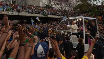 Wrong turn in pope’s car leads to Brazil mob scene