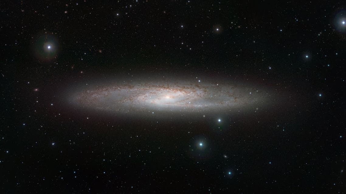 The NGC 253 galaxy, aslo known as the silver coin galaxy, has given experts new information on the development of solar systems. (Photo courtesy: Discover Magazine)