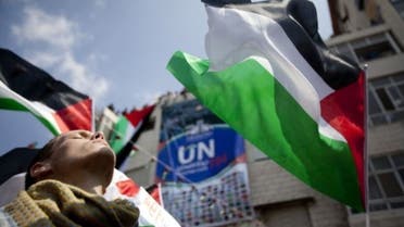 Palestinians attend a demonstration in support the Palestinian bid for recognition of statehood at the United Nations on Sept. 21, 2011 in Ramallah, West Bank.