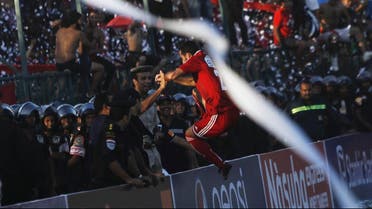 Al Ahly's Mohamed Abo Trika (C) celebrates with fans after scoring against derby rivals Zamalek during their CAF Champions League soccer match on July 24, 2013. (Reuters)