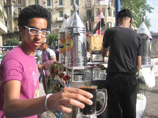 An Egyptian boy holding a cup of Erk soos. (Photo courtesy: rj310.blogspot.ae)