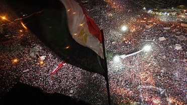 Anti-Mursi protesters chant slogans during a mass protest to support the army in Tahrir square in Cairo, July 26, 2013. (Reuters)