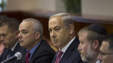 Israel's Prime Minister Benjamin Netanyahu (C) attends the weekly cabinet meeting in Jerusalem July 28, 2013. (AFP)