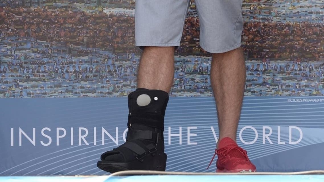 American swimming gold-metalist Michael Phelps arrived at the Swimming Worlds in Barcelona with a fractured foot. (Photo courtesy: The Associated Press)