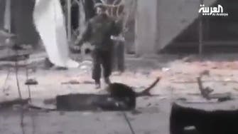 Video: Syrian officer drops own arm, talks to rebels