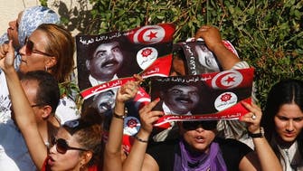 Tunisian police fire tear gas at anti-government protesters